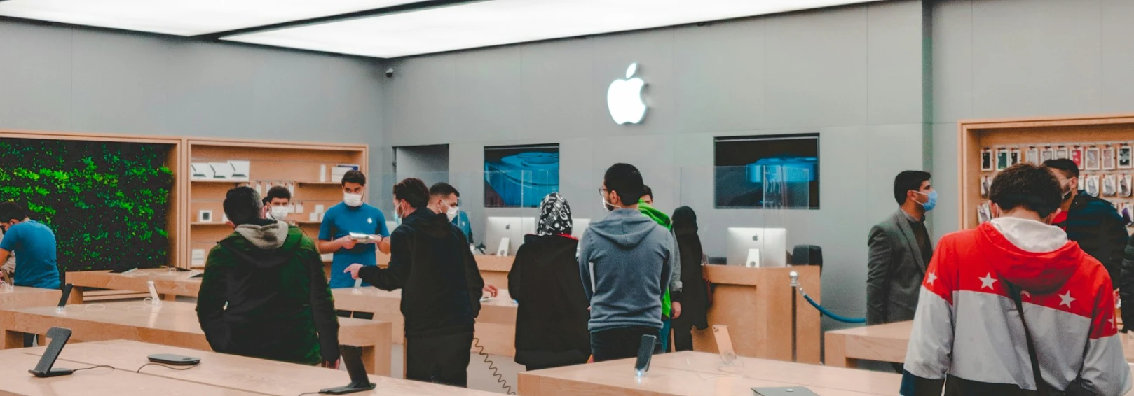 Customers in an Apple Store buying the new Apple Watch models
